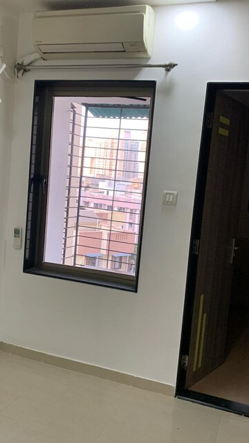 Building Lobby in 1.5 BHK Apartment at Sierra Towers, Kandivali East – for Sale