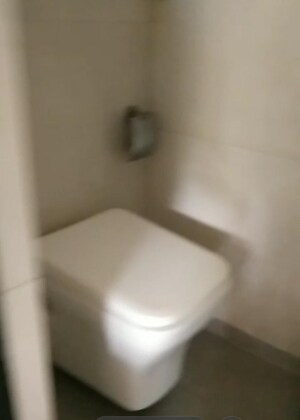 Bathroom in 1 BHK Apartment at Umiya Nagar CHS, Goregaon East – for Sale