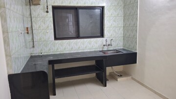 Kitchen in 2 BHK Apartment at Karan Gharonda, Wadgaon Sheri – for Rent