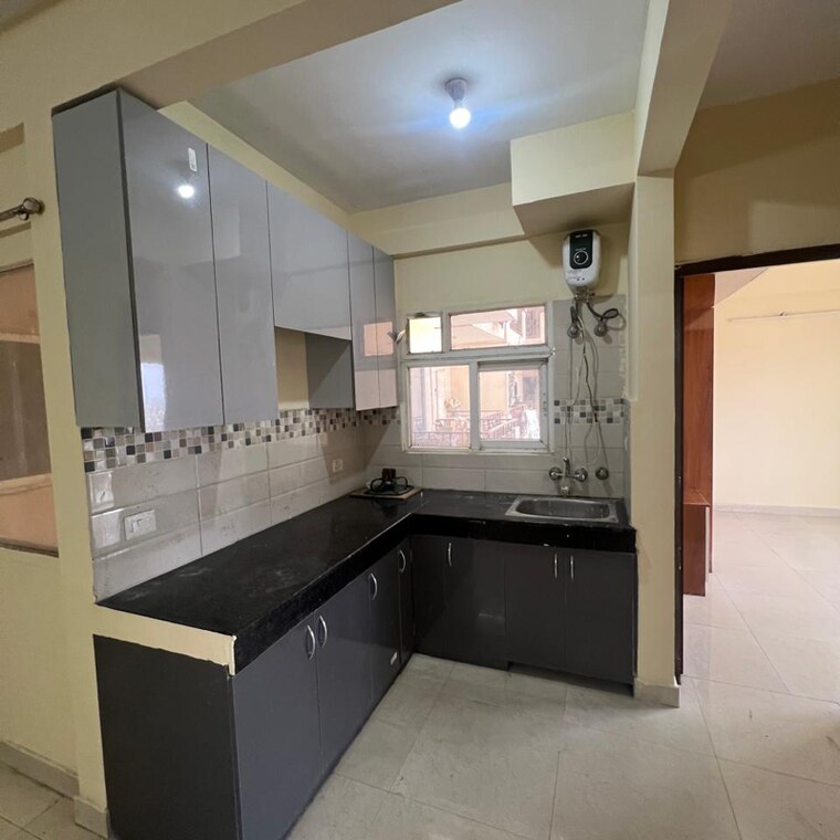 Kitchen, signature-global-orchard-avenue 2 Bedroom 591 Sq.Ft. Apartment In Sector 93 Gurgaon 8638538