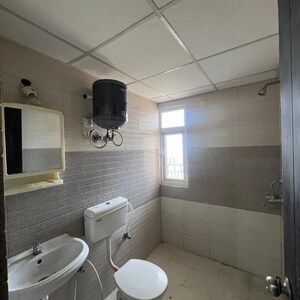 Bathroom in 2 BHK Apartment at Signature Global Orchard Avenue, Sector 93 – for Sale
