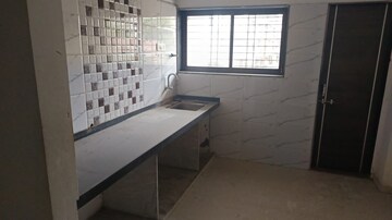 Kitchen in 2 BHK Apartment at Rm Park – for Sale
