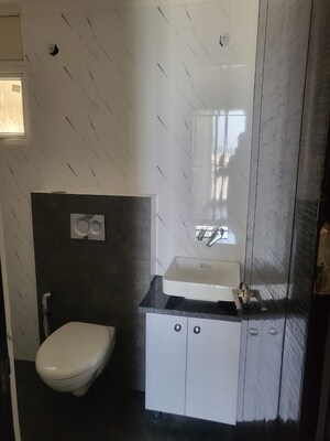 Bathroom in 4 BHK Apartment at Paradigm Business Hermitage Park, Dhakoli – for Sale