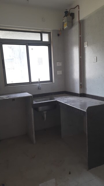 Kitchen in 1 BHK Apartment at Atul Trans Residency, Andheri East – for Rent