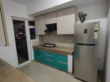 Kitchen in 2 BHK Apartment at ROF Aalayas, Sector 102 – for Sale
