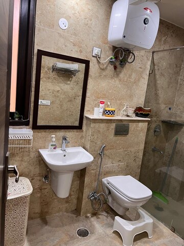 Bathroom in 4 BHK Builder Floor at Ansal Sushant Lok I, Sector 43 – for Rent