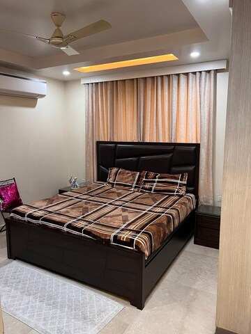 Bedroom in 4 BHK Builder Floor at Ansal Sushant Lok I, Sector 43 – for Rent
