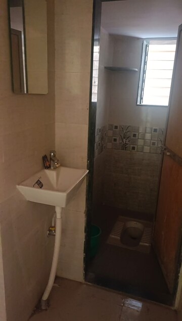 Bathroom in 2 BHK Apartment at Pareira Nagar CHS, Ganeshwadi – for Rent