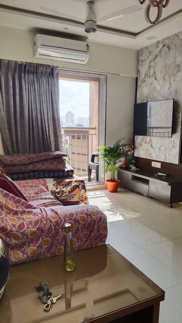 Living Room in 1 BHK Apartment at Metropolis Aquaris Phase 2, Kasarvadavali – for Rent