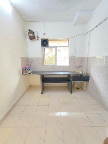 Kitchen in 1 BHK Apartment at Mhada CHS, Vasant Vihar – for Rent