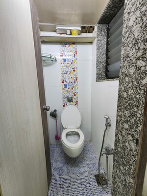 Bathroom in 1.5 BHK Apartment at Golden Palace CHS, Kandivali East – for Sale