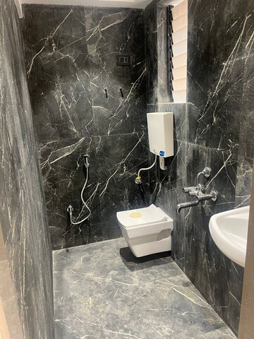Bathroom in 2 BHK Apartment at Raj Tulsi Aawas, Badlapur East – for Sale