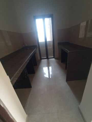 Kitchen in 3 BHK Apartment at Sunteck Maxxworld, Naigaon East – for Rent