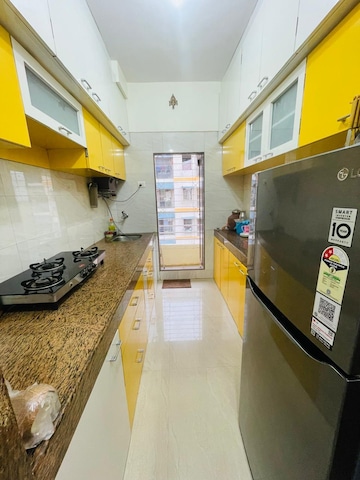Kitchen in 2 BHK Apartment at Arkade Art Phase 2, Mira Road – for Sale