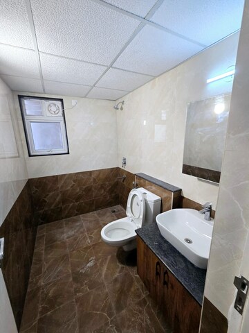 Bathroom in 2.5 BHK Apartment at Salarpuria Sattva Exotic, Kogilu – for Rent