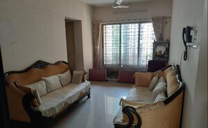 Living Room in 3 BHK Apartment at Neptune CHS Andheri West, Andheri West – for Sale