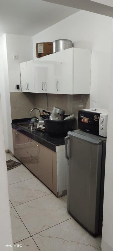 Kitchen in 3 BHK Apartment at Rishita Manhattan, Gomti Nagar – for Rent