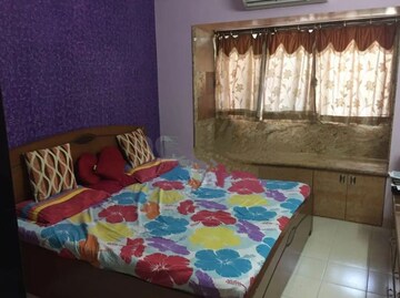 Bedroom in 2 BHK Apartment at Lokhandwala Riviera Tower, Kandivali East – for Sale