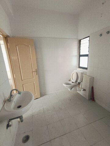 Bathroom in 3 BHK Apartment at Sunny Enclave – for Rent