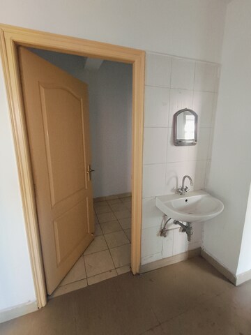 Bathroom in 3 BHK Apartment at Sunny Enclave – for Rent