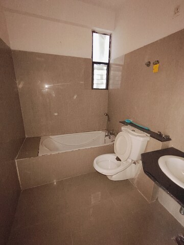 Bathroom in 3 BHK Apartment at Sunny Enclave – for Rent