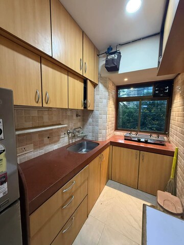 Kitchen in 1 BHK Apartment at Lokhandwala Complex – for Rent