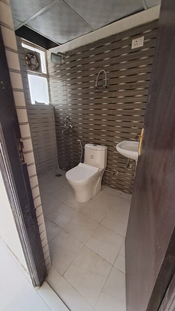 Bathroom in 2 BHK Apartment at Sector 16c Greater Noida – for Rent