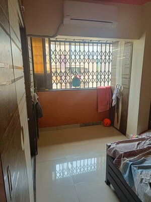 Bedroom in 1 BHK Apartment at Babhai Naka – for Sale