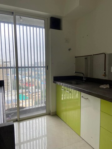 Kitchen in 2 BHK Apartment at Courtyard by Narang Realty and The Wadhwa Group, Pokhran Road No Two – for Rent