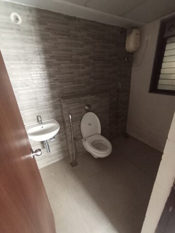 Bathroom in 1.5 BHK Apartment at Lodha Lakeshore Greens, Dombivli East – for Rent