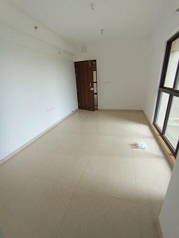 Living Room in 1 BHK Apartment at Lodha Palava River Front, Dombivli East – for Rent