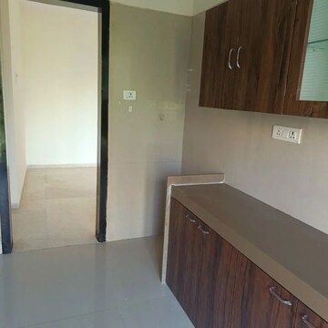 Kitchen in 2 BHK Apartment at Dosti Group Imperia, Manpada – for Rent