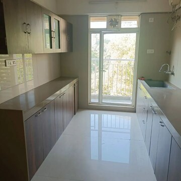 Kitchen in 2 BHK Apartment at Dosti Group Imperia, Manpada – for Rent