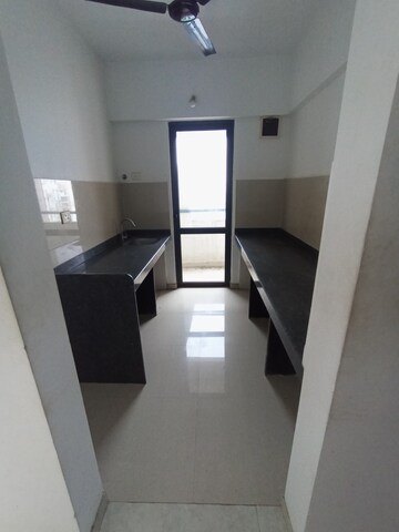 Kitchen in 1 BHK Apartment at Lodha Lakeshore Greens, Dombivli East – for Rent