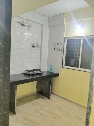 Kitchen in 1 BHK Apartment at Krushi CHS, Gokhalenagar – for Rent