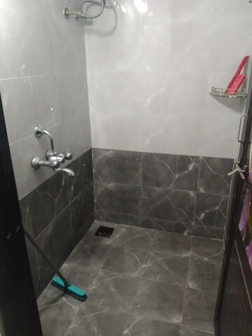 Bathroom in 1 BHK Apartment at Nisarg CHS, Gokhalenagar – for Rent