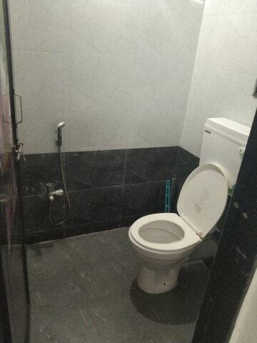 Bathroom in 1 BHK Apartment at Nisarg CHS, Gokhalenagar – for Rent
