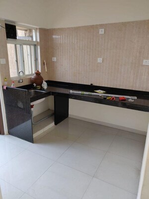 Kitchen in 1 BHK Apartment at Ganga New town, Dhanori – for Sale