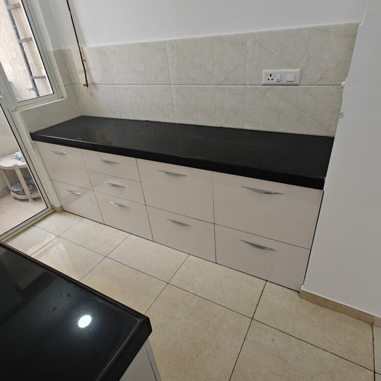 Kitchen, mahindra-lifespaces-centralis-4 2 Bedroom 550 Sq.Ft. Apartment In Pimpri Chinchwad Pcmc Pune 8640878