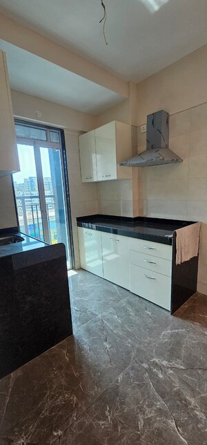 Kitchen in 2 BHK Apartment at Kini Tower, Virar West – for Sale