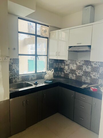 Kitchen in 2 BHK Apartment at Ramada Aalayas, Sector 102 – for Rent