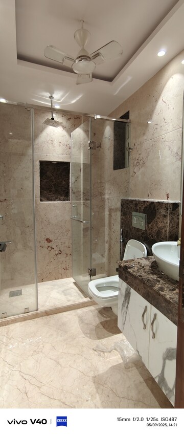 Bathroom in 4 BHK Builder Floor at RWA Hauz Khas Block C 5, Hauz Khas – for Rent