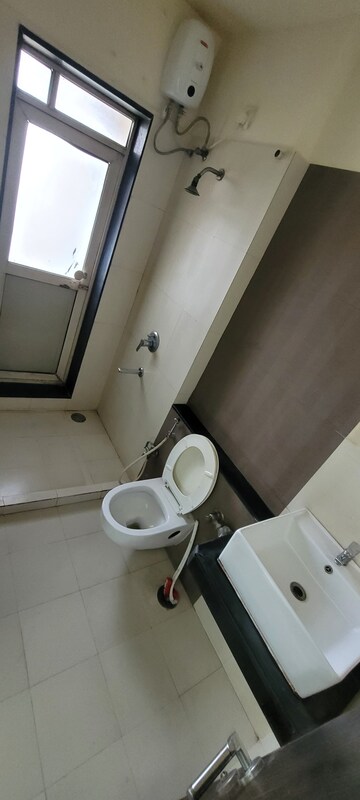 Bathroom in 2 BHK Apartment at Rustomjee Athena, Majiwada – for Rent
