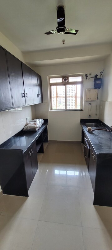 Kitchen in 2 BHK Apartment at Rustomjee Athena, Majiwada – for Rent
