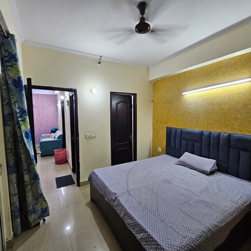 Bedroom in 2 BHK Apartment at Gardenia Golf City, Noida Central – for Rent