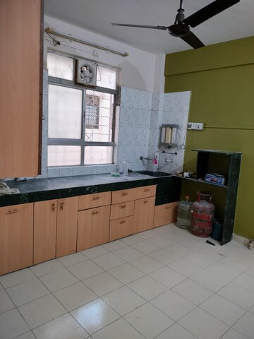Kitchen in 2 BHK Apartment at Borate Jijai Nagari, Kothrud – for Rent
