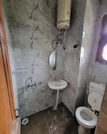 Bathroom in 3 BHK Apartment at Pragati Apartments Dwarka, Sector 11 Dwarka – for Rent