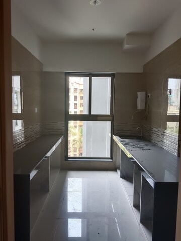 Kitchen in 2 BHK Apartment at Rajesh Raj Infinia, Malad West – for Rent
