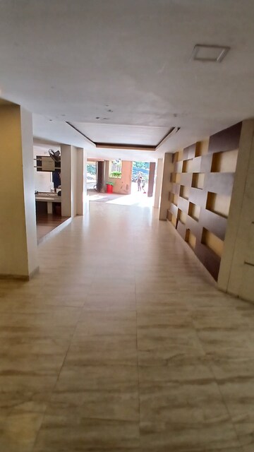 Room in 2 BHK Apartment at Lokhandwala Whispering Palms, Kandivali East – for Sale