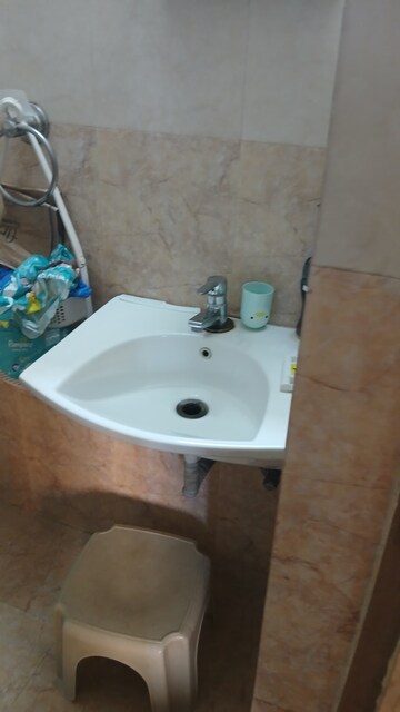 Bathroom in 2 BHK Apartment at Lokhandwala Whispering Palms, Kandivali East – for Sale